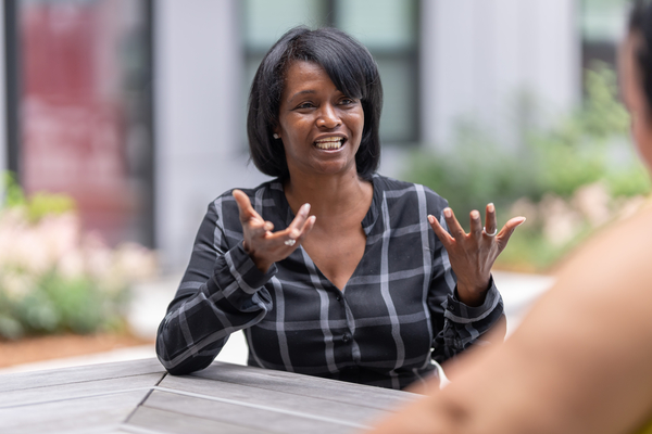 Woman speaking to friend